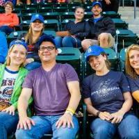 Group of 4 smiling at the Comerica Park event